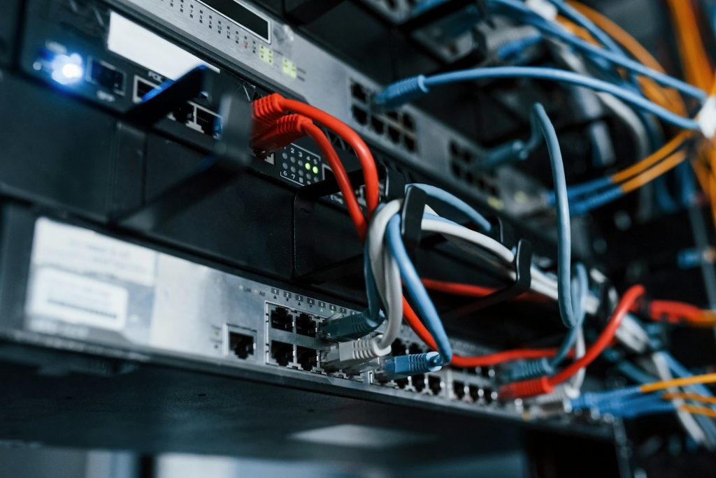 Close up view of internet equipment and cables in the server room